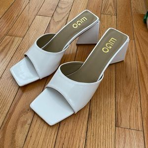 White heeled sandals